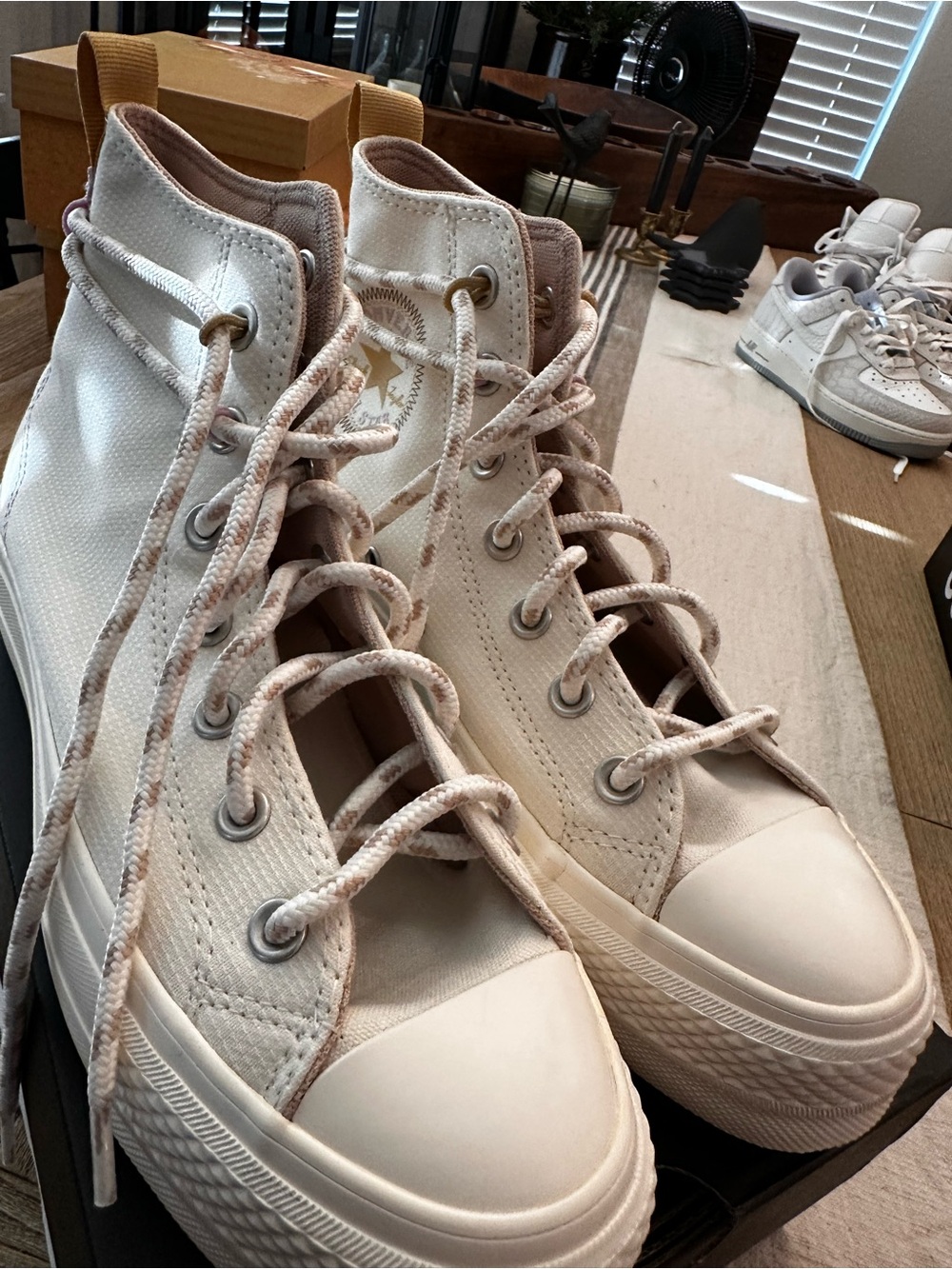Converse High-Top Platform Sneakers in Cream with Tan Pull Tab
